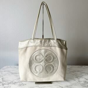 9. Coach Laura Silver Metallic Op Art Leather Lightweight Shoulder Tote Bag